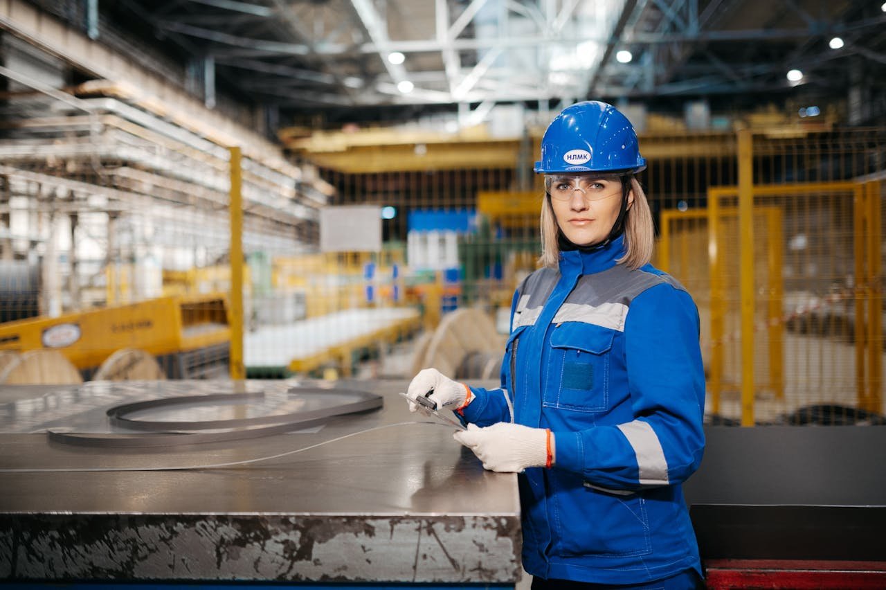 Professional female engineer working in a modern industrial facility in Russia, highlighting engineering and manufacturing.